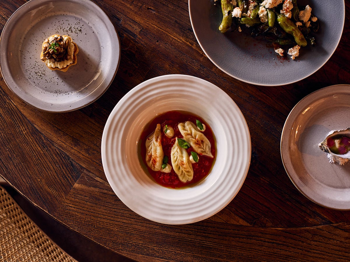 plates of food on the table at at Pilloni, Brisbane