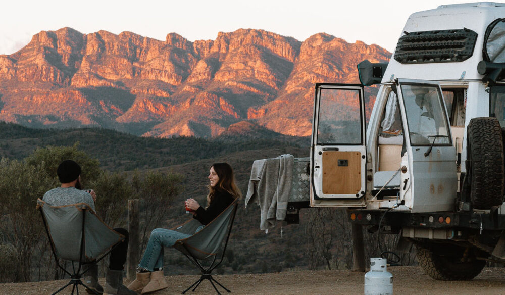 Couple sitting on camping chairs at Bunyeroo Valley Lookout