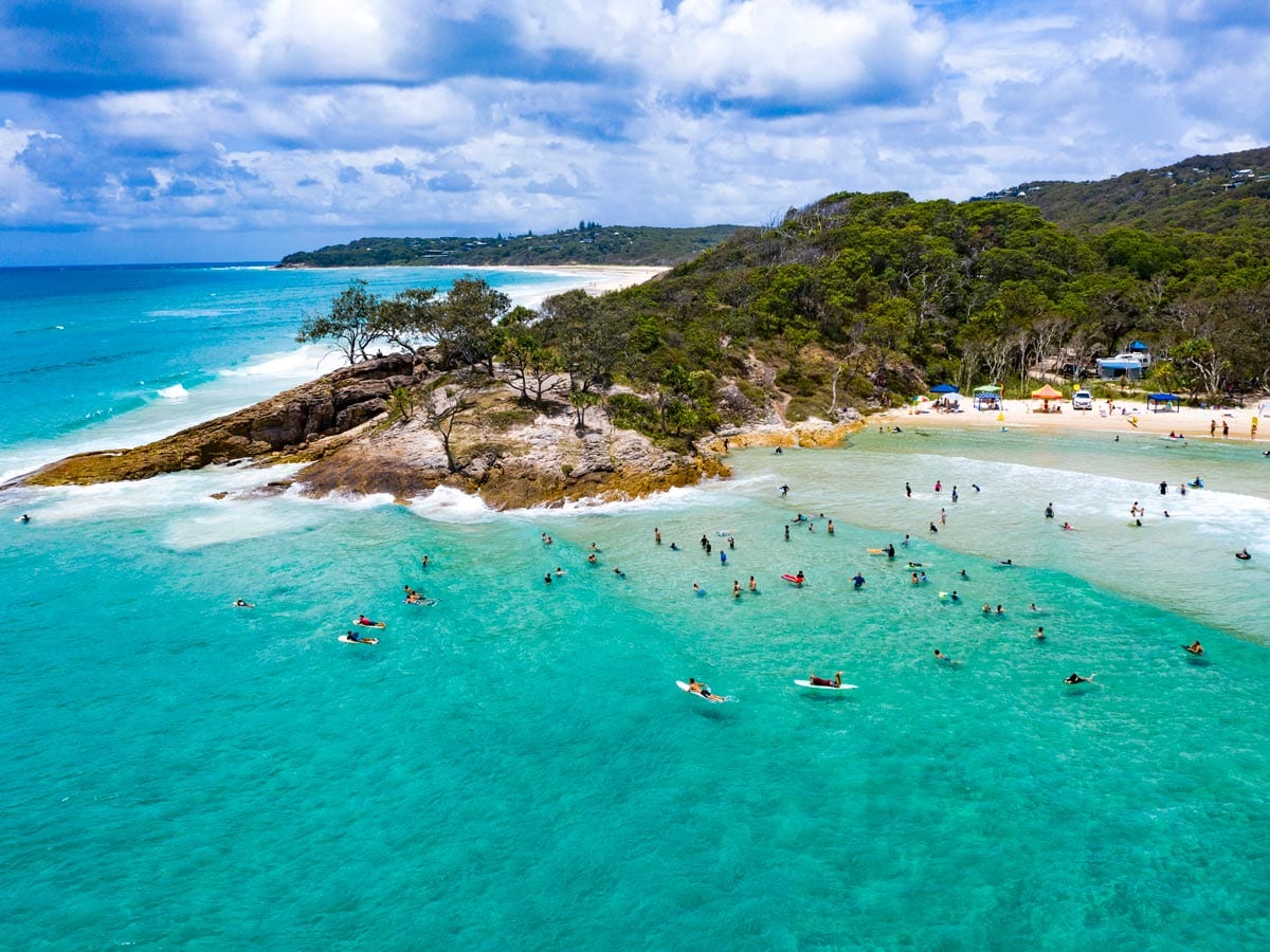 Surfers in the water.