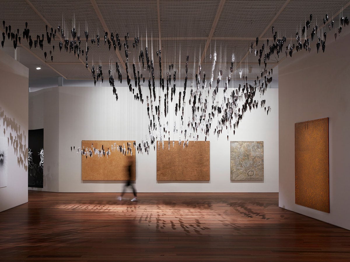 Woman at an exhibition inside the Art Gallery of NSW in Sydney