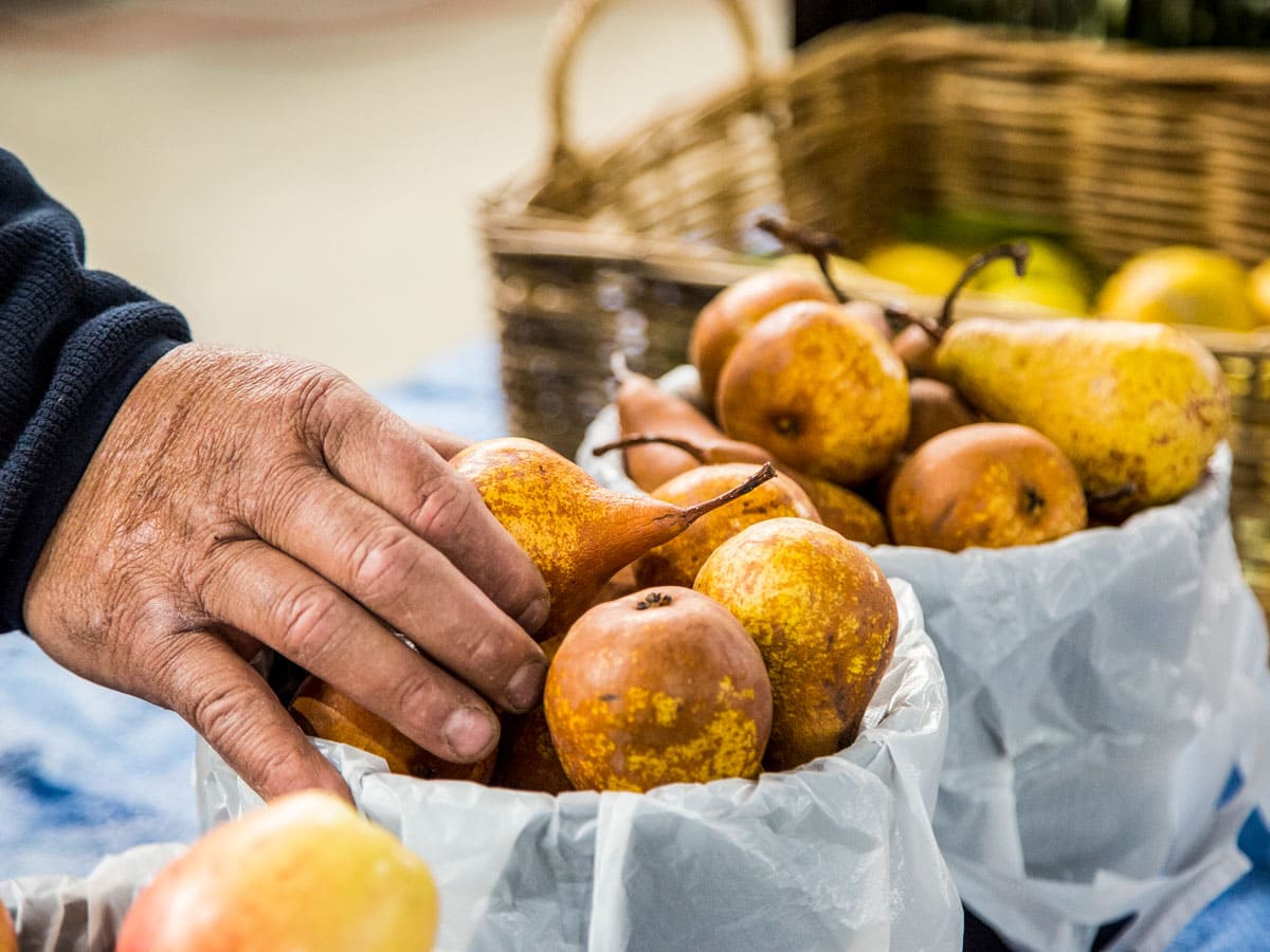 fresh pears available for purchase at the Orange Farmers Market.