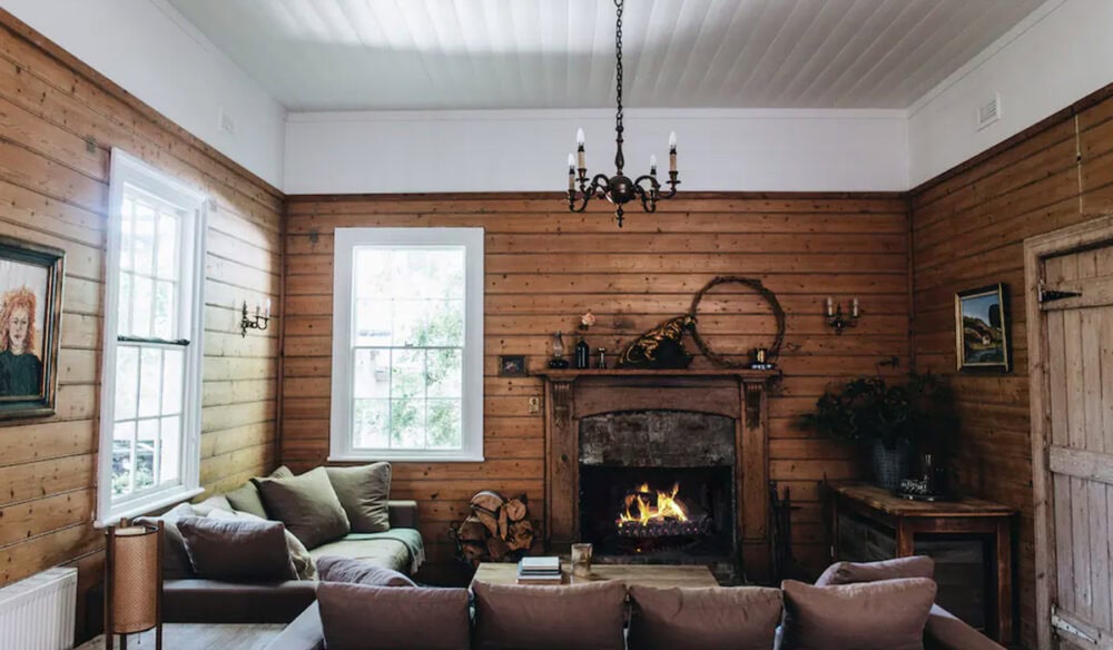 lounge room and fireplace at Poet's Lodge, Daylesford VIC